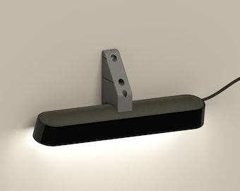 Barra de reproducción Hue detrás del soporte de pared para TV