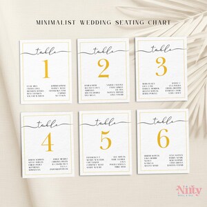 May include: A set of six minimalist wedding seating chart cards. Each card features a gold-colored table number and guest names, set against a white background with a gold border. The text "MINIMALIST WEDDING SEATING CHART" is at the top.