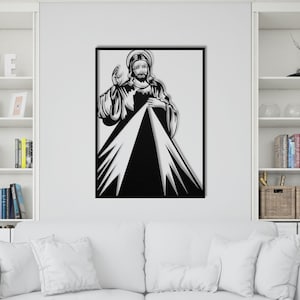 May include: Black and white metal wall art depicting Jesus Christ with a heart and rays of light emanating from his chest.