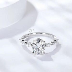 Oval CZ Promise Ring: 925 Sterling Silver, White Gold Plated