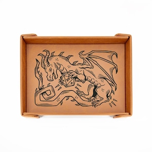 May include: A brown leatherette dice tray with a black illustration of a dragon holding a twenty-sided die. The tray has a rectangular shape with rounded corners and a stitched border. The dragon is depicted with wings and flames.