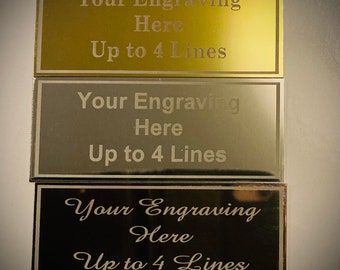 70x25mm personalised engraving plate with border. Available in gold silver and bronze