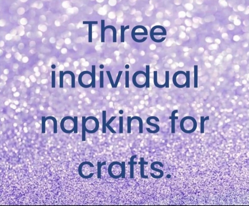 May include: Three individual napkins for crafts. The text is displayed in dark blue font against a bright, out-of-focus, sparkling light purple background that creates a bokeh effect across the entire image surface.