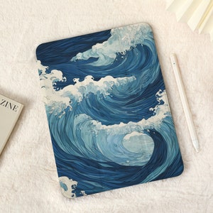 May include: A blue and white illustrated design of waves crashing on a tablet case. The case is made of a durable material and is designed to protect your tablet from scratches and bumps.