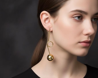 Geometric Gold Statement Earrings: Artistic Brass Drop Jewelry