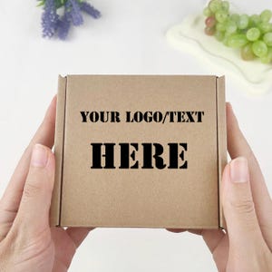 May include: A brown cardboard box with the text "YOUR LOGO/TEXT HERE" printed in black.