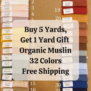 May include: A fabric swatch chart featuring 32 colors of organic muslin. The chart includes a variety of colors, from light pastels to deep blues and reds. Text on the image promotes a 'Buy 5 Yards, Get 1 Yard Gift' offer.