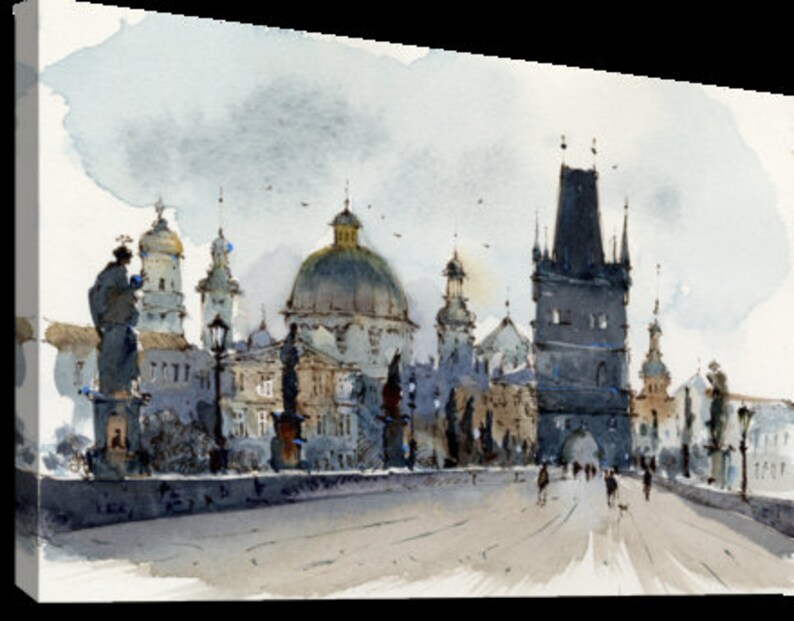May include: A watercolor painting of a cityscape with a bridge and several buildings. The buildings are a mix of styles, including a tall tower, a domed church, and a few smaller buildings. The bridge is arched and has a stone railing. The painting is done in a muted color palette of grays, blues, and browns.