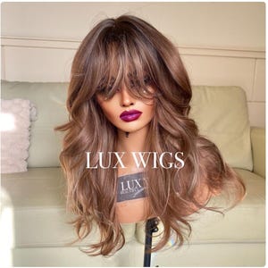 Emily. Brown Wig with plenty of layers. Some Blonde Highlights. 24 inch natural  brown wig by LUX