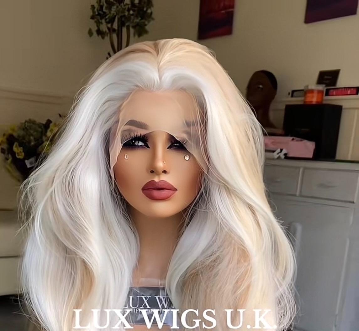 Soniah. Blonde Lace Front Wig. Ash and strawberry blonde wig with platinum highlights, long layers lace front wig. Natural 26 inch long wig