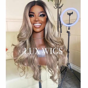 blonde wig. long blonde wig. blonde lace front wig. blonde synthetic wig. blonde human hair wig.