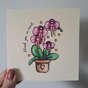 Tarjeta de felicitación de agradecimiento con orquídea en blanco, con flores de pedrería y sobre, hecha a mano, con acuarela, genérica.