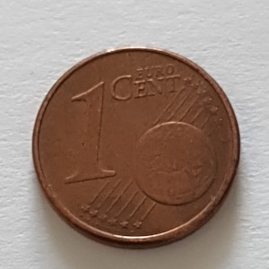 2004 Moneda de 1 centavo estampada con varios defectos