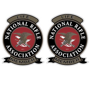 May include: Two black and white stickers with a red, white, and blue eagle design. The stickers say "Life National Rifle Association Member" in a circular design.