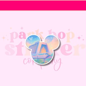 May include: A die-cut sticker in the shape of Mickey Mouse ears featuring a colorful illustration of a resort building and monorail against a sunset sky. The sticker has the text "Park Hopper Company" in a pink, cursive font.