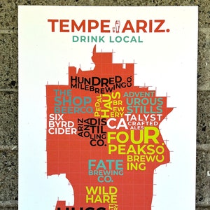 May include: A map of Tempe, Arizona, with the names of local breweries and distilleries written in a word cloud style. The map is outlined in red and the text is in various colours, including yellow, blue, and green.
