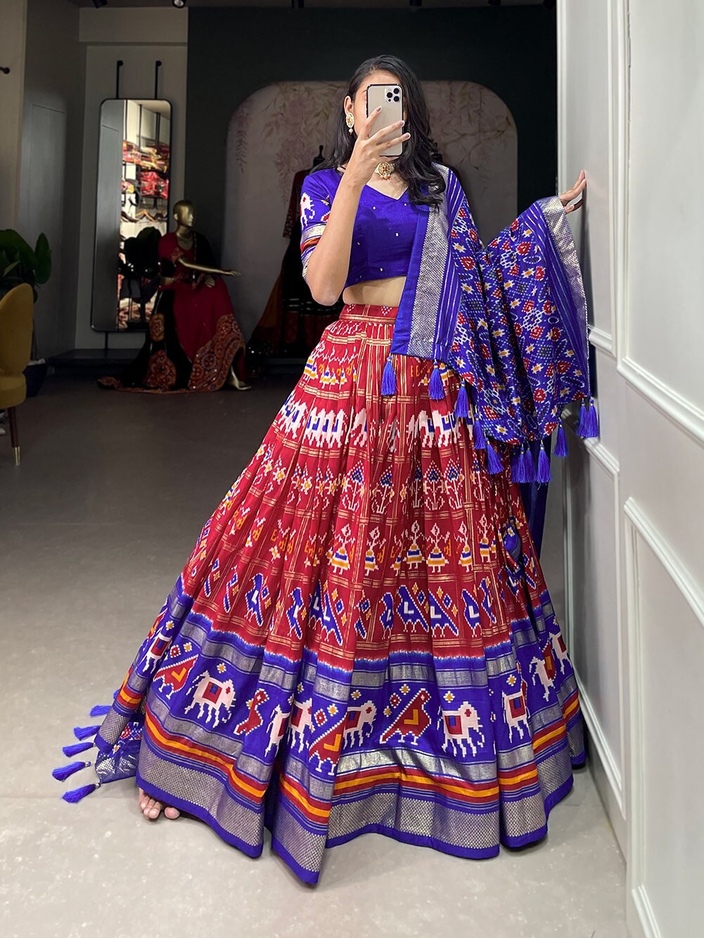 Blue and top red lehenga choli