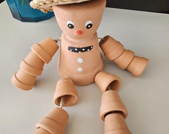 El hombre de la olla grande