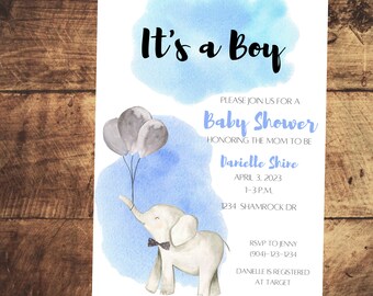 May include: It's a Boy baby shower invitation with a watercolor blue background and a cute cartoon elephant holding balloons. The invitation includes the date, time, and location of the shower, as well as the name of the mom-to-be, Darielle Shire.