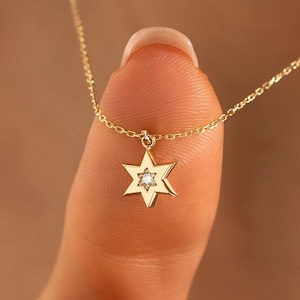 diamond necklace	14k gold necklace	dainty gold necklace	diamond pendant	diamond jewish star	david star pendant	diamond david star	14k diamond necklace	gold star of david	magen david pendant	star of david charm	david necklace gold	jewish star necklace