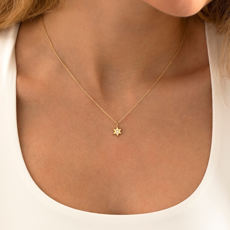 diamond necklace	14k gold necklace	dainty gold necklace	diamond pendant	diamond jewish star	david star pendant	diamond david star	14k diamond necklace	gold star of david	magen david pendant	star of david charm	david necklace gold	jewish star necklace