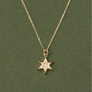 diamond necklace	14k gold necklace	dainty gold necklace	diamond pendant	diamond jewish star	david star pendant	diamond david star	14k diamond necklace	gold star of david	magen david pendant	star of david charm	david necklace gold	jewish star necklace