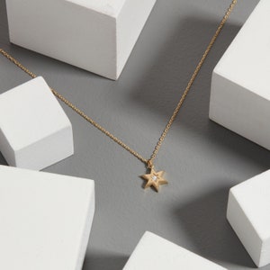 diamond necklace	14k gold necklace	dainty gold necklace	diamond pendant	diamond jewish star	david star pendant	diamond david star	14k diamond necklace	gold star of david	magen david pendant	star of david charm	david necklace gold	jewish star necklace