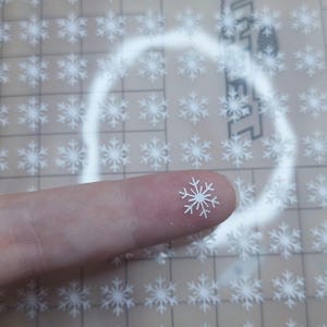 100 pegatinas de copos de nieve blancos