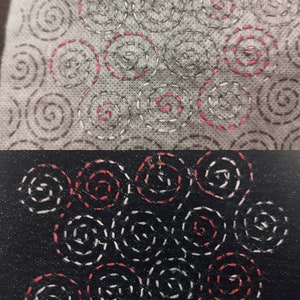 Top half shows pink and white stitching through the sashiko transfer. Bottom half shows the stitching on a dark denim background after the transfer has been washed away.
