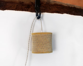 Knitted mesh portable lamp, hanging accent lamp. Handmade designer pendant light. Handcrafted eco-designed textile lighting, night light.