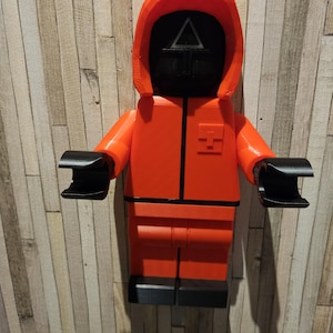 Personaggio "big brick style" idea regalo per il gioco dei calamari giganti della carta igienica