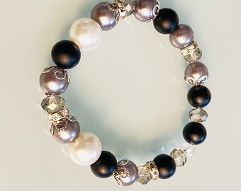 Silver,  black and white fashion bracelet.