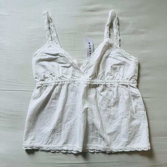 white flowy sleeveless top