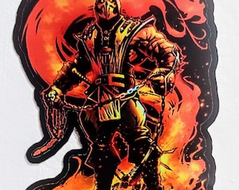 May include: A black and yellow character with a red hood and a chain weapon stands in a fiery orange and yellow background. The character is wearing a black and yellow outfit with a red sash. The character is surrounded by flames.