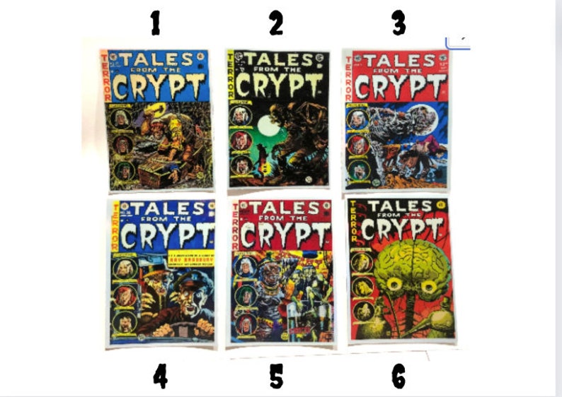 K&ouml;nnte beinhalten: Sechs Vintage-Comic-Cover mit dem Titel "Tales from the Crypt". Die Cover sind alle in Rot, Wei&szlig; und Blau mit Schwarzwei&szlig;illustrationen von Horrorszenen. Die Cover sind von 1 bis 6 nummeriert.