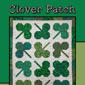 May include: Clover Patch quilt pattern featuring a white background with a grid of nine green four-leaf clover designs. The quilt is framed with a green border. The text "Clover Patch" is at the top of the image. The text "Molly Cook for Villa Rosa Designs" is at the bottom of the image.