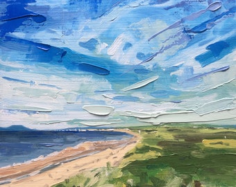May include: A painting of a beach scene with a blue sky, white clouds, and a sandy beach with green grass in the foreground.