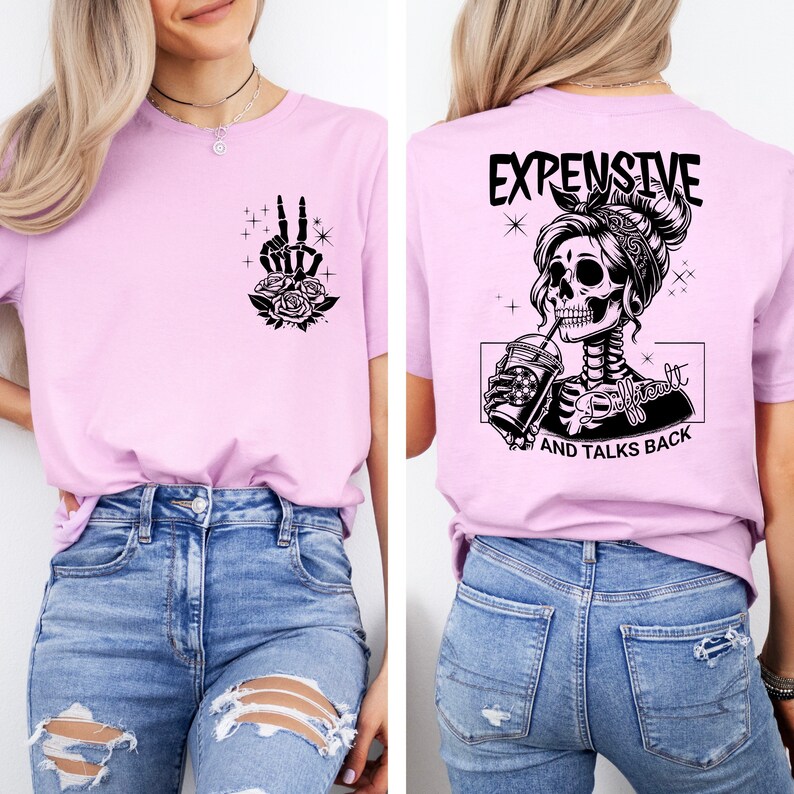 May include: Pink t-shirt with a skeleton hand making a peace sign with flowers on the left side and a skull with a coffee cup and the text "Expensive and Talks Back" on the right side.