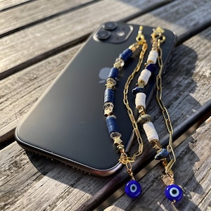 Bijou de téléphone œil porte-bonheur – Grigri smartphone bleu et or – Accessoire tendance