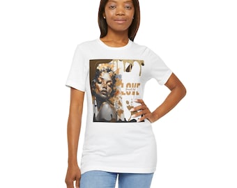May include: White t-shirt featuring a graphic of a woman with a floral crown and the word "LOVE" in gold lettering. The artwork has a black and gold color scheme. The shirt is made of a soft material and has short sleeves.