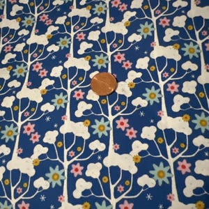 Tilda Fabric—Wildgarden Blue — Jubilee. Sold by the 1/2 yard. 100% Cotton.