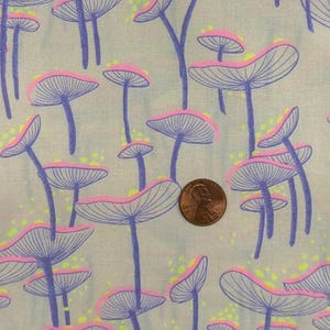 May include: A fabric featuring a repeating pattern of stylized mushrooms. The mushrooms have light purple stems and caps outlined in dark purple with pink and yellow accents. The background is a light grey colour.