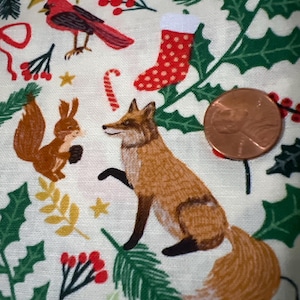 Christmas Spirit by Mia Charro for FreeSpirit. Sold by the 1/2 yard. 100% Cotton.
