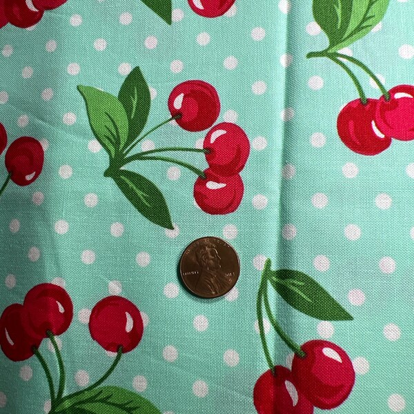 Cherry Dot by Michael Miller. Sold by the 1/2 yard. 100% Cotton.