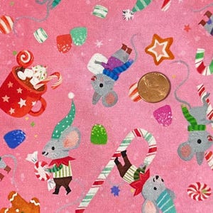 Jingle Pals de Kathryn Selbert para Robert Kaufman. Se vende por media yarda. 100 % algodón. Navidad.