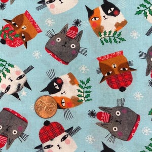 Terry Runyan for Benartex. Sold by the 1/2 yard. 100% Cotton. Meowy Christmas.