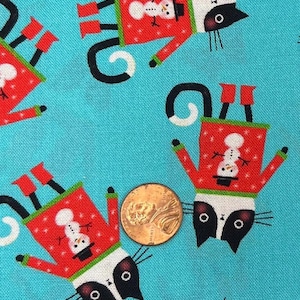 Terry Runyan for Benartex. Sold by the 1/2 yard. 100% Cotton. Meowy Christmas.