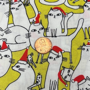 Terry Runyan for Benartex. Sold by the 1/2 yard. 100% Cotton. Meowy Christmas.
