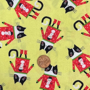 Terry Runyan for Benartex. Sold by the 1/2 yard. 100% Cotton. Meowy Christmas.