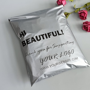 May include: Silver mailing bag with the text "Hi Beautiful! Thank you for supporting YOUR LOGO www.yourwebsite.com"